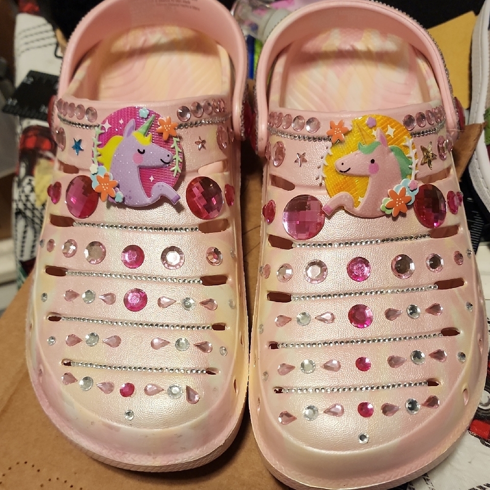 Playful Pink Slippers with Cartoon Embellishments